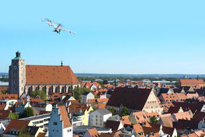 Bild vergrößern: Illustration City Airbus über Ingolstadt